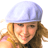 A pixelated close-up of a person with long brown hair wearing a light blue cap, smiling slightly against a white background.
