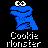 Pixelated blue character with large white eyes and black pupils, standing against dark background with stylized text below.