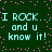 Green background with pink pixel dots and repeated cyan text "I ROCK... I ROCK. and u know it!" in a