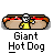 Pixel art of a character in yellow shirt holding two hot dogs with red toppings, labeled 'Giant Hot Dog' text below.