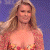 A pixelated image of a woman with long blonde hair wearing a colorful patterned top against a purple background, next to green text reading 'Original Icons .com' on dark green.