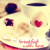 A breakfast plate with a cup of coffee, an egg with a red heart, and text reading 'breakfast with love' in red script.