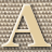 A static pixelated image of a stylized letter A with internal geometric shapes on a checkered background.