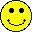 Six yellow pixelated smiley faces arranged in two on a gray background, each with distinct mouth shapes and small blue accents