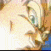 A pixelated character with light brown hair and green eyes, shown in four of animation against a blue background