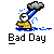 A 3x3 contact sheet of nine animated frames showing a pixel art character with a white face and yellow body under a gray cloud, rain falling from the cloud onto blue water below, with text "Bad Day" beneath each frame.