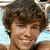 A split-screen image shows two people on the left and a blue text on the right with green text reading "Ryan Sheckler is Hot!"