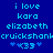 Blue background with light blue pixelated text reading 'i love kara elizabeth cruickshank' and a heart symbol followed by 'x33', displayed in two identical side-by-side