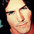 A four- shows a person with long dark hair and light skin in three distinct poses against a dark background with blue accents
