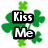 Green four-leaf clovers with white text reading 'Kiss Me', 'My', and 'Friend Is Irish' on a white background.