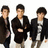 Three pixelated figures in dark jackets stand against a white background, with cyan text on a purple reading 'there so HOT' to the right