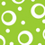 Green background with scattered white circles and dots of varying sizes, some partially visible at edges.