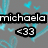 Pixelated text 'michaela' and '<33' over gray background with cyan heart shapes, some hearts animated as floating or pulsing.