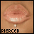 Pixelated close-up of lips with a lip piercing and visible teeth, labeled "PIERCED" below.