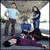 A four- shows a group of people in various poses with 'FALL OUT BOY' text below, featuring pixelated animation changes between