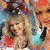 Two women with long blonde hair pose together in a colorful, pixelated image; one wears a teal top and the other a dark blue outfit.