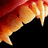 Pixelated red text on black background with partial image of orange and brown creature in top-left corner.