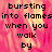 Pixelated text reads 'bursting into flames when you walk by' over a pink and yellow flame-like background with one gray