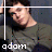 Pixelated image of a person with dark hair wearing a gray shirt, showing two side-by-side views with text labels below each.
