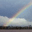 A four- shows a rainbow over clouds with text overlays: 'ITS NOT ALWAYS' in top-right, 'RAINBOWS & BUTTERFLIES' in bottom-left