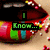 Four of a pixelated mouth with colorful sprinkles, each displaying different text in distinct colors