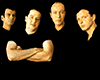 Animated sequence of a bald man in black shirt with crossed arms, showing head rotation and lightning effects around him.