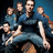 Pixelated group image of five people in blue clothing with text overlays reading "Rockin' The World," "Everyday! Everyone Loves," and "Maroon 5! <3" on a white background.