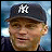 Pixelated image of a person wearing a dark cap with white 'NY' logo, light brown hair visible beneath the cap, and a blurred blue background.