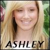A static image of a person with long blonde hair and a white top, with the name 'ASHLEY' in bold black text at the bottom.