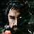 Static 48x48 pixel buddy icon showing a heavily pixelated figure with light skin tone, dark hair, and sunglasses against a dark background with scattered white speckles.