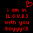 Red pixelated text on black background reads 'i am in [L.O.V.E.] with you boyyy<3' with a red heart symbol above the first line.