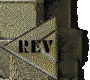 A static image of a triangular icon with 'REV' text on it, set against a textured background.