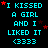 A digital image displays repeated text "I KISSED A GIRL AND I LIKED IT <333>" in cyan letters with red stars on a black background, featuring animated star movements across frames.