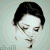 A pixelated image of a person with dark hair and closed eyes on the left, next to green text reading 'Original Icons .com' on a solid background.