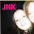 Pixelated static image with pink text 'JMX' on dark background and large white circular shape on right.