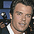 Four pixelated headshots of a man in various poses and expressions arranged in a , each with distinct facial positions and clothing details