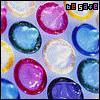 Static image of colorful glossy circular shapes resembling condoms on a light background with "be safe" text in the top-right corner.