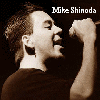 A sepia-toned animated image shows a person singing into a microphone with raised fist, transitioning from clear to blurred motion.