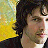 A pixelated buddy icon featuring a person with dark hair against a yellow background, with the name "james blunt" in stylized text on the right side.