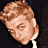 A 4-frame contact sheet of a pixelated animated icon featuring three distinct male faces and the text "Coolbuddy.com" on a black background.