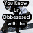 Animated sequence of a person in athletic gear bending forward with text overlays about being obsessed with 'Heel, Toe' during class.