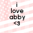 A static image with pink and white diagonal stripes, displaying black text 'i love abby <3' in a pixelated font.
