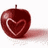 A pixelated red apple with a heart-shaped outline on its surface and a small stem, casting a soft shadow to the right.