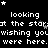Pixelated text repeats 'looking at the stars' and 'wishing you were here' with scattered star symbols on a black background.