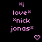 Pixelated pink text and symbols on black background with two identical static frames showing 'love* *nick jonas*' and heart icons.