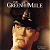 Static pixelated image of a person's face with dark hair and visible text at the top, likely from an old movie or book cover.
