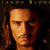 Pixelated static image of a person's face with long hair, warm lighting, and dark background.