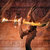 A pixelated figure with a long neck and dark body stands against a warm-toned background with horizontal light streaks.