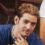 repeated identical images showing a person in blue and white clothing with hand near chin, overlaid with 'HATT' text