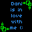 Blue text on black background reads 'Dani is in love with me :(' with green pixelated square symbols at corners and sides.